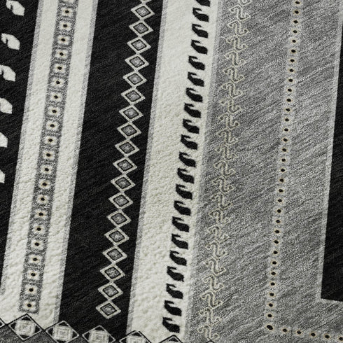 5' X 8' Black Gray And Silver Tribal Washable Area Rug With UV Protection