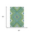 5' X 8' Lime Green Teal And Ivory Tribal Washable Area Rug With UV Protection
