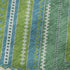 5' X 8' Lime Green Teal And Ivory Tribal Washable Area Rug With UV Protection