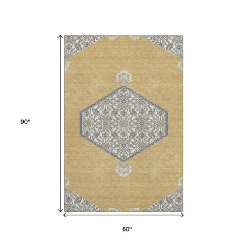 5' X 8' Gold Ivory And Gray Oriental Washable Area Rug With UV Protection