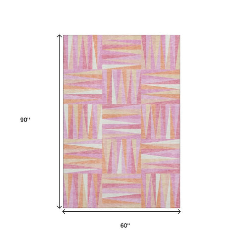 5' X 8' Blush Peach And Ivory Geometric Washable Area Rug With UV Protection