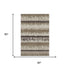 5' X 8' Brown Beige And Ivory Striped Washable Area Rug With UV Protection