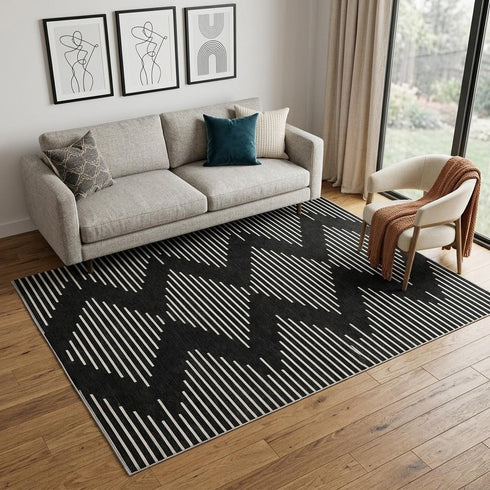 5' X 8' Black And Ivory Geometric Washable Area Rug With UV Protection