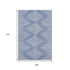 9' X 12' Denim Blue And Ivory Geometric Washable Area Rug With UV Protection