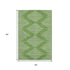 5' X 8' Green And Ivory Geometric Washable Area Rug With UV Protection