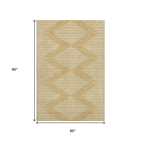 5' X 8' Gold And Ivory Geometric Washable Area Rug With UV Protection
