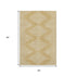 5' X 8' Gold And Ivory Geometric Washable Area Rug With UV Protection