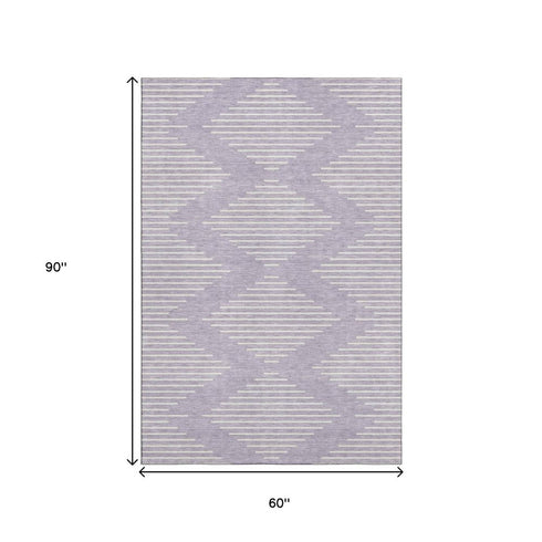 5' X 8' Lavender And Ivory Geometric Washable Area Rug With UV Protection