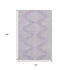 5' X 8' Lavender And Ivory Geometric Washable Area Rug With UV Protection