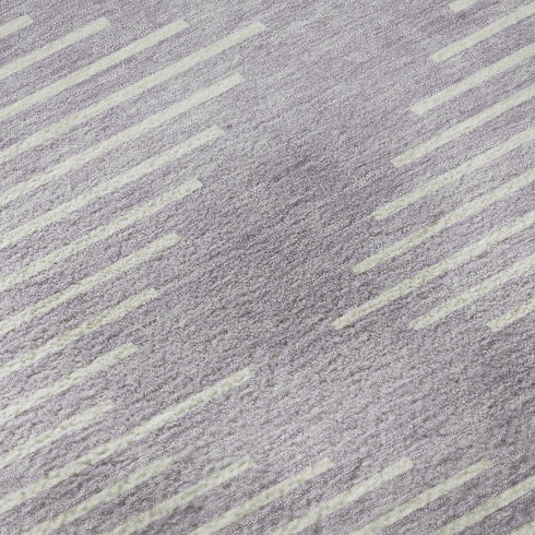 5' X 8' Lavender And Ivory Geometric Washable Area Rug With UV Protection