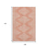 9' X 12' Salmon And Ivory Geometric Washable Area Rug With UV Protection