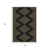 5' X 8' Black And Gold Geometric Washable Area Rug With UV Protection
