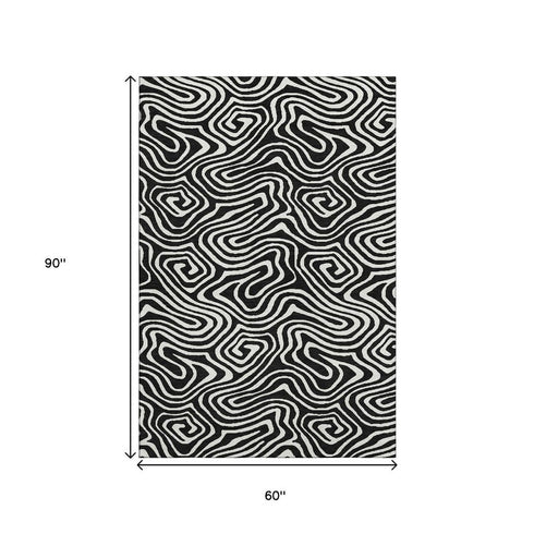 5' X 8' Black And Ivory Abstract Washable Area Rug With UV Protection