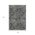 5' X 8' Black And Ivory Abstract Washable Area Rug With UV Protection