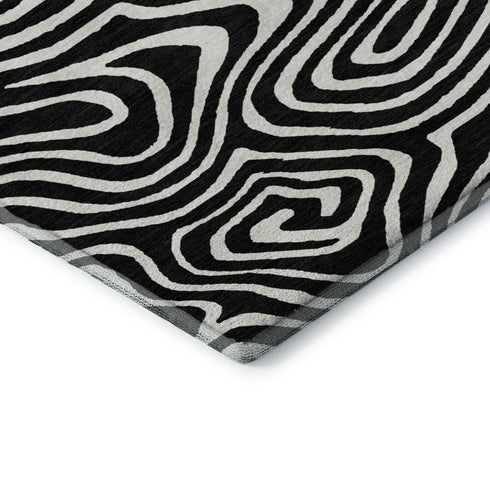 5' X 8' Black And Ivory Abstract Washable Area Rug With UV Protection