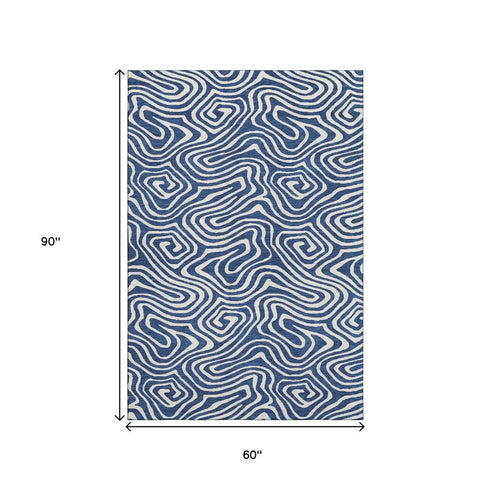 5' X 8' Navy Blue And Ivory Abstract Washable Area Rug With UV Protection