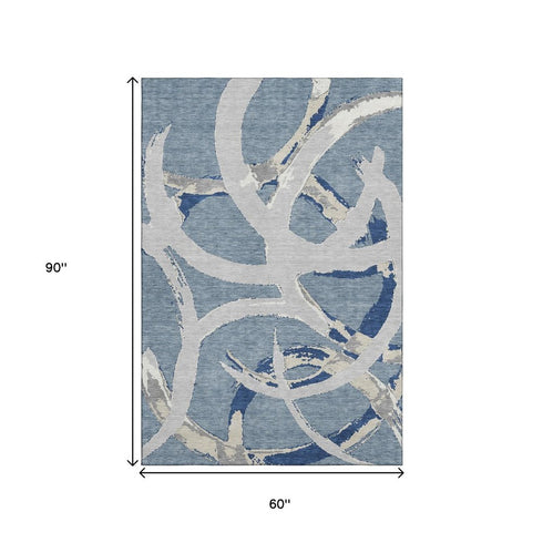 5' X 8' Denim Blue Gray And Ivory Abstract Washable Area Rug With UV Protection