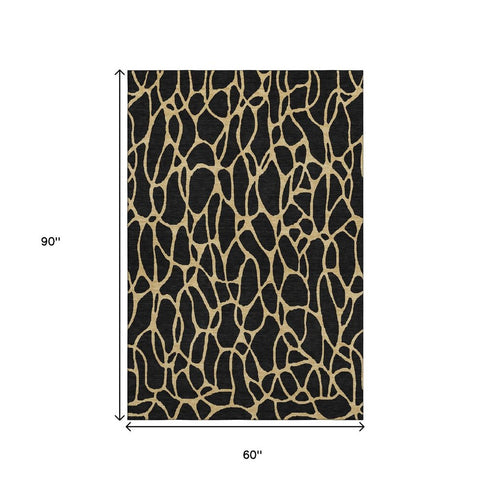 5' X 8' Black And Gold Geometric Washable Area Rug With UV Protection