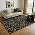 5' X 8' Black And Gold Geometric Washable Area Rug With UV Protection