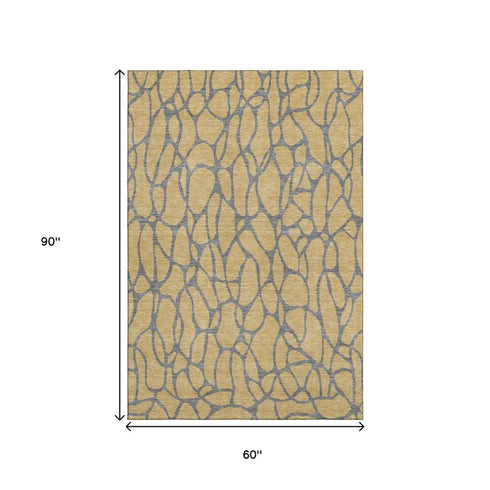 5' X 8' Gold And Gray Geometric Washable Area Rug With UV Protection