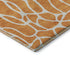 5' X 8' Orange And Ivory Geometric Washable Area Rug With UV Protection