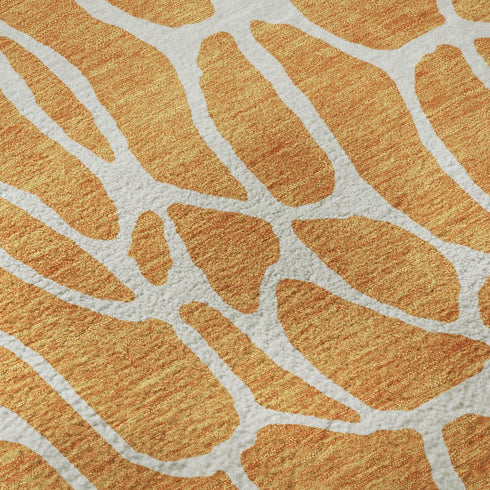 5' X 8' Orange And Ivory Geometric Washable Area Rug With UV Protection
