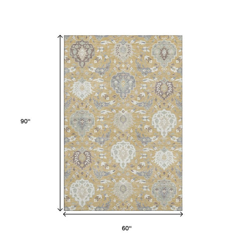 5' X 8' Gold Gray And Ivory Damask Washable Area Rug With UV Protection
