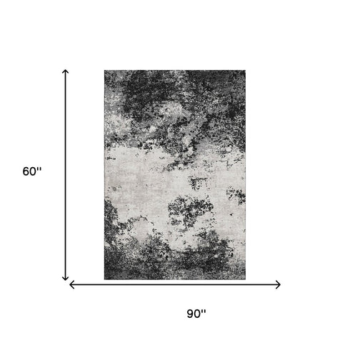 5' X 8' Black Gray And Silver Abstract Washable Area Rug With UV Protection