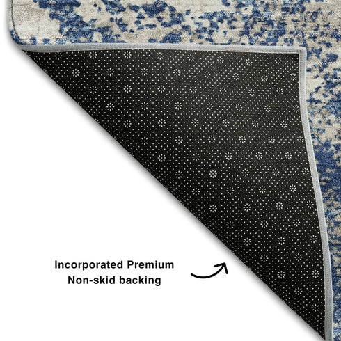 5' X 8' Navy Blue And Ivory Abstract Washable Area Rug With UV Protection