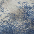 5' X 8' Navy Blue And Ivory Abstract Washable Area Rug With UV Protection