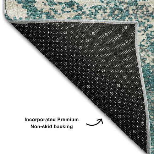 8' X 10' Teal And Ivory Abstract Washable Area Rug With UV Protection