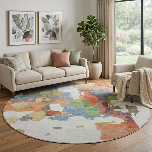 8' Ivory Orange Blue And Green Abstract Washable Round Rug With UV Protection