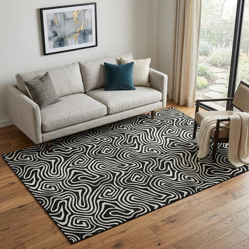 5' X 8' Black And Ivory Abstract Washable Area Rug With UV Protection