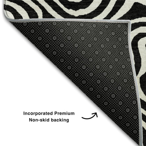5' X 8' Black And Ivory Abstract Washable Area Rug With UV Protection