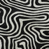 5' X 8' Black And Ivory Abstract Washable Area Rug With UV Protection