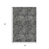 5' X 8' Black And Ivory Abstract Washable Area Rug With UV Protection