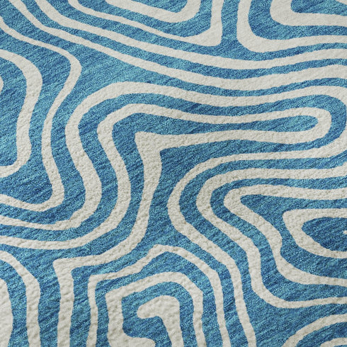 8' X 10' Teal And Ivory Abstract Washable Area Rug With UV Protection