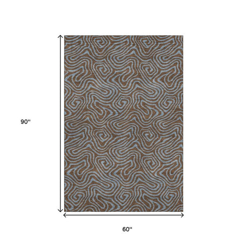 5' X 8' Brown And Sky Blue Abstract Washable Area Rug With UV Protection