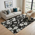 5' X 8' Black And Ivory Floral Washable Area Rug With UV Protection