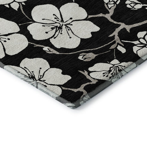 8' X 10' Black And Ivory Floral Washable Area Rug With UV Protection