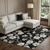 9' X 12' Black And Ivory Floral Washable Area Rug With UV Protection