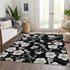 9' X 12' Black And Ivory Floral Washable Area Rug With UV Protection