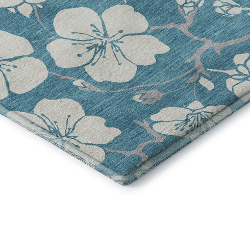 9' X 12' Turquoise And Ivory Floral Washable Area Rug With UV Protection