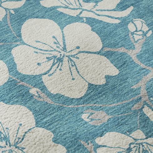 9' X 12' Turquoise And Ivory Floral Washable Area Rug With UV Protection