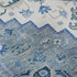 5' X 8' Blue Ivory And Gray Oriental Washable Area Rug With UV Protection