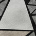5' X 8' Black Beige And Ivory Geometric Washable Area Rug With UV Protection