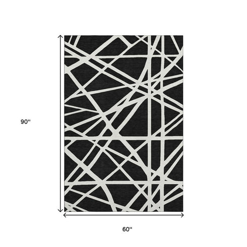 5' X 8' Black And Ivory Geometric Washable Area Rug With UV Protection
