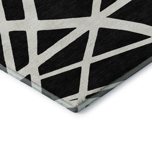 5' X 8' Black And Ivory Geometric Washable Area Rug With UV Protection