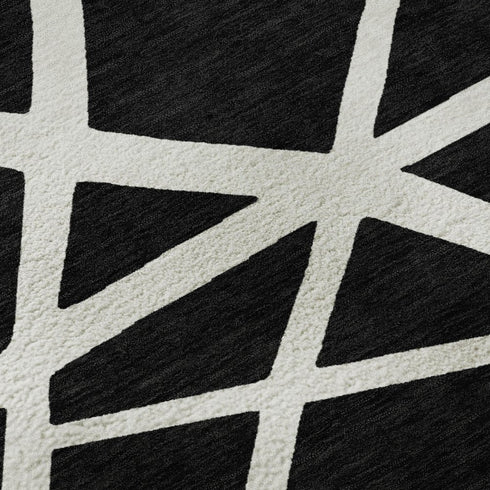 5' X 8' Black And Ivory Geometric Washable Area Rug With UV Protection