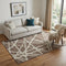 5' X 8' Brown And Ivory Geometric Washable Area Rug With UV Protection